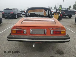 1978 Alfa Romeo Spider z VIN 115410002071, wystawiony jako Copart lot #75574404 z przebiegiem 50 587 mil mil oraz Tytuł czysty. Historia ofert i sprzedaży dostępna na DreamBid. Obrazek 6.