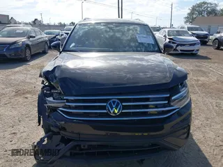 2024 Volkswagen Tiguan SE z VIN 3VV3B7AX8RM192033, wystawiony jako IAAI lot #41568271 z przebiegiem 2 851 mil mil oraz . Historia ofert i sprzedaży dostępna na DreamBid. Obrazek 12.