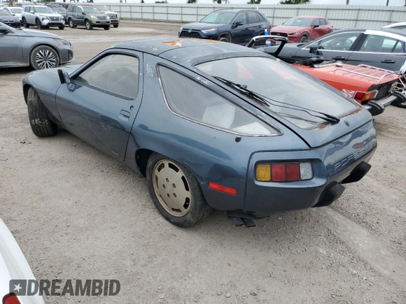 1981 Porsche 928 z VIN WP0JA0929BS820364, wystawiony jako Copart lot #76286414 z przebiegiem 40 205 mil mil oraz Szkoda całkowita • Salvage title. Historia ofert i sprzedaży dostępna na DreamBid. Obrazek 2.