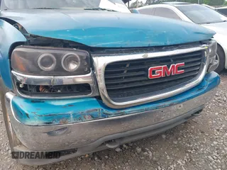 2001 GMC Yukon SLT z VIN 1GKEK13TX1J191325, wystawiony jako IAAI lot #42306665 z przebiegiem Nie podano mil oraz . Historia ofert i sprzedaży dostępna na DreamBid. Obrazek 6.