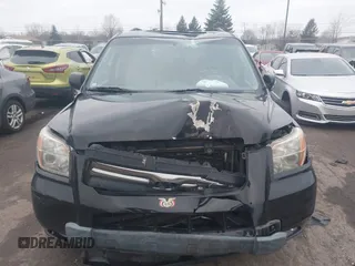 2007 Honda Pilot EX-L with VIN 2HKYF18507H526293, listed as a IAAI auction lot 41111983 with 101,170 mi miles. Bid and sale history available at carsss.com. Image 6.