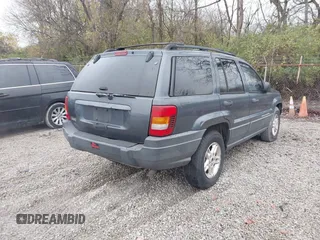 2003 Jeep Grand Cherokee Laredo with VIN 1J4GX48SX3C604904, listed as a IAAI auction lot 40884443 with 188,352 mi miles. Bid and sale history available at carsss.com. Image 4.