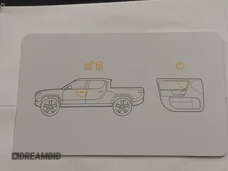 2022 Rivian R1T Adventure z VIN 7FCTGAAA8NN015369, wystawiony jako IAAI lot #41407842 z przebiegiem 22 507 mil mil oraz . Historia ofert i sprzedaży dostępna na DreamBid. Obrazek 19.