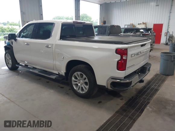 2023 Chevrolet Silverado 1500 LTZ with VIN 1GCUDGEDXPZ100414, listed as a IAAI auction lot 40005559 with 40,000 mi miles and . Bid and sale history available at DreamBid. Image 3.