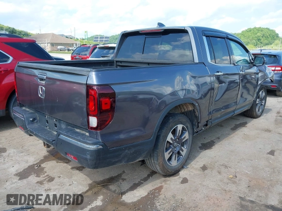 2018 Honda Ridgeline RTL-E with VIN 5FPYK3F74JB004162, listed as a IAAI auction lot 42180687 with 160,805 mi miles and . Bid and sale history available at DreamBid. Image 4.