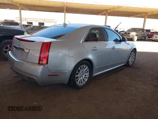 2013 Cadillac CTS Luxury with VIN 1G6DE5E52D0156666, listed as a IAAI auction lot 42058687 with 120,659 mi miles and . Bid and sale history available at DreamBid. Image 4.