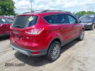 2013 Ford Escape SE with VIN 1FMCU9GX8DUB80346, listed as a IAAI auction lot 42789409 with 157,200 mi miles and . Bid and sale history available at DreamBid. Image 4.