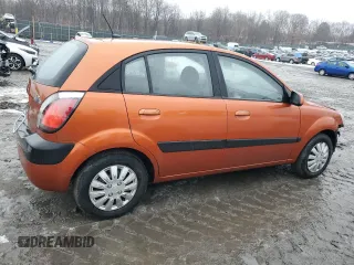 2009 Kia Rio LX with VIN KNADE243396530327, listed as a Copart auction lot 44631785 with 123,170 mi miles and Salvage Title. Bid and sale history available at carsss.com. Image 3.