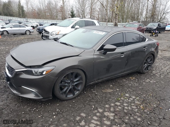 2016 Mazda Mazda6 i Grand Touring with VIN JM1GJ1W56G1416904, listed as a Copart auction lot 88482175 with 126,620 mi miles and Salvage Title. Bid and sale history available at carsss.com. Image 1.