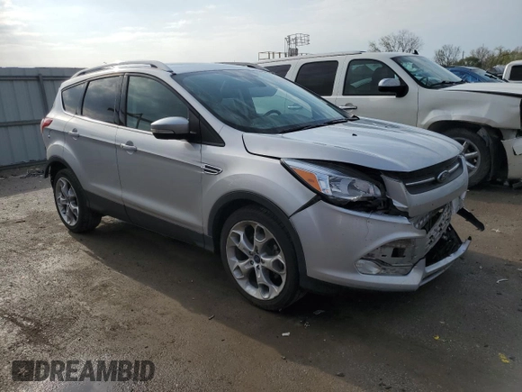 2015 Ford Escape Titanium with VIN 1FMCU0JX5FUA08248, listed as a Copart auction lot 53635435 with 120,010 mi miles and Salvage Title. Bid and sale history available at DreamBid. Image 4.