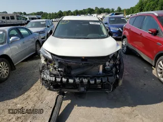 2024 Nissan Rogue S with VIN 5N1BT3AB5RC701934, listed as a Copart auction lot 61430615 with 21,609 mi miles and Salvage title. Bid and sale history available at DreamBid. Image 5.