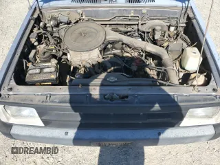 1993 Mazda B-Series Truck z VIN JM2UF3130P0378304, wystawiony jako Copart lot #58799925 z przebiegiem 132 801 mil mil oraz Szkoda całkowita • Salvage title. Historia ofert i sprzedaży dostępna na DreamBid. Obrazek 11.