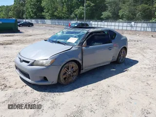 2012 Scion tC z VIN JTKJF5C70C3038591, wystawiony jako IAAI lot #42337910 z przebiegiem 191 646 mil mil oraz . Historia ofert i sprzedaży dostępna na DreamBid. Obrazek 2.