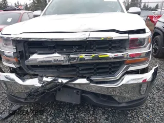 2017 Chevrolet Silverado 1500 LT with VIN 1GCUKREC1HF135337, listed as a IAAI auction lot 41267713 with 114,417 mi miles and . Bid and sale history available at DreamBid. Image 6.