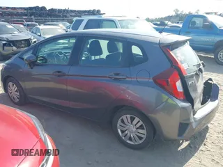 2015 Honda Fit LX with VIN 3HGGK5H52FM771511, listed as a IAAI auction lot 42132749 with 96,666 mi miles and . Bid and sale history available at DreamBid. Image 14.