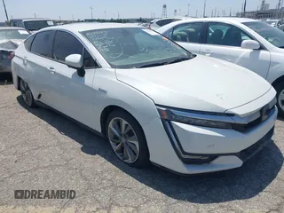 2018 Honda Clarity Touring z VIN JHMZC5F35JC011054, wystawiony jako IAAI lot #42544579 z przebiegiem Nie podano mil oraz . Historia ofert i sprzedaży dostępna na DreamBid. Obrazek 1.