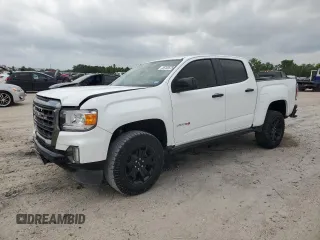 2022 GMC Canyon 4WD AT4 z VIN 1GTG6FEN8N1136558, wystawiony jako Copart lot #55768575 z przebiegiem 68 281 mil mil oraz Szkoda całkowita • Salvage title. Historia ofert i sprzedaży dostępna na DreamBid. Obrazek 1.