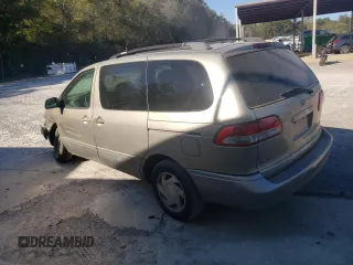 2001 Toyota Sienna LE with VIN 4T3ZF13C11U390198, listed as a Copart auction lot 76785094 with 200,803 mi miles and Salvage Title. Bid and sale history available at carsss.com. Image 2.