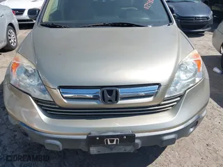 2007 Honda CR-V EX with VIN JHLRE38587C029980, listed as a IAAI auction lot 41789624 with 213,517 mi miles. Bid and sale history available at carsss.com. Image 6.