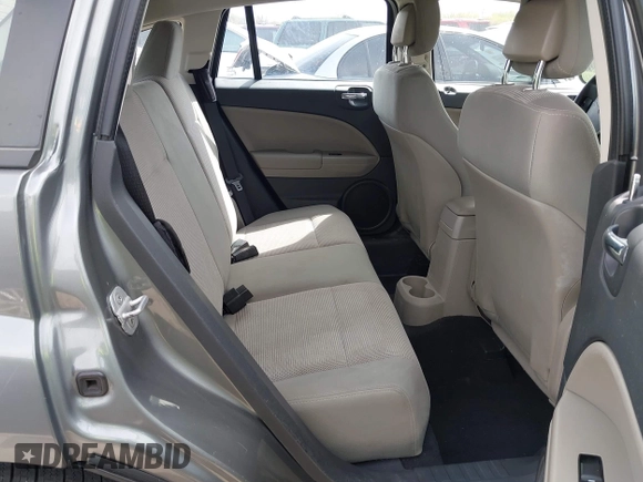 2012 Dodge Caliber SXT with VIN 1C3CDWDA6CD506019, listed as a IAAI auction lot 41999560 with 146,446 mi miles and . Bid and sale history available at DreamBid. Image 8.