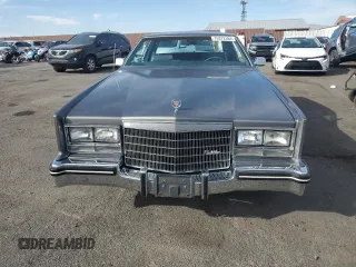 1985 Cadillac Eldorado z VIN 1G6EL5786FE628861, wystawiony jako Copart lot #76372384 z przebiegiem 15 146 mil mil oraz Szkody całkowita. Historia ofert i sprzedaży dostępna na DreamBid. Obrazek 5.