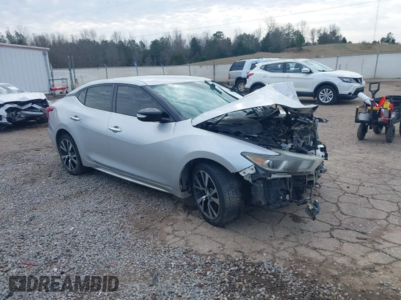 2016 Nissan Maxima SV with VIN 1N4AA6AP7GC439288, listed as a IAAI auction lot 41572262 with 223,185 mi miles and . Bid and sale history available at DreamBid. Image 1.