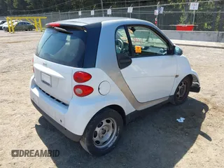 2012 Smart fortwo Pure z VIN WMEEJ3BAXCK563660, wystawiony jako IAAI lot #42165195 z przebiegiem 53 809 mil mil oraz . Historia ofert i sprzedaży dostępna na DreamBid. Obrazek 4.
