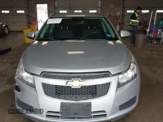 2013 Chevrolet Cruze 1LT with VIN 1G1PC5SB6D7314923, listed as a IAAI auction lot 42071232 with 105,918 mi miles and . Bid and sale history available at DreamBid. Image 12.