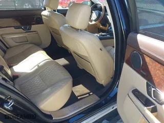 2018 Jaguar XJ with VIN SAJWJ2GD2J8W13463, listed as a IAAI auction lot 41897451 with 70,448 mi miles. Bid and sale history available at carsss.com. Image 8.