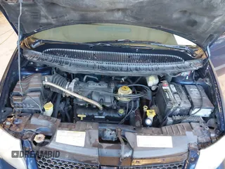 2003 Dodge Grand Caravan with VIN 2D4GP24353R195035, listed as a IAAI auction lot 41574068 with 209,165 mi miles and . Bid and sale history available at DreamBid. Image 10.