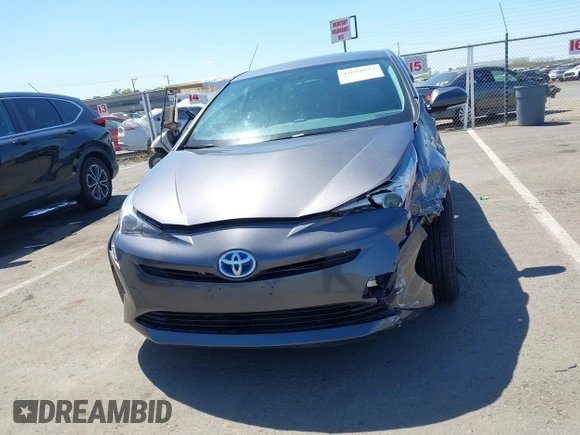 2016 Toyota Prius Two z VIN JTDKBRFU1G3521884, wystawiony jako IAAI lot #42081852 z przebiegiem 93 107 mil mil oraz . Historia ofert i sprzedaży dostępna na DreamBid. Obrazek 12.