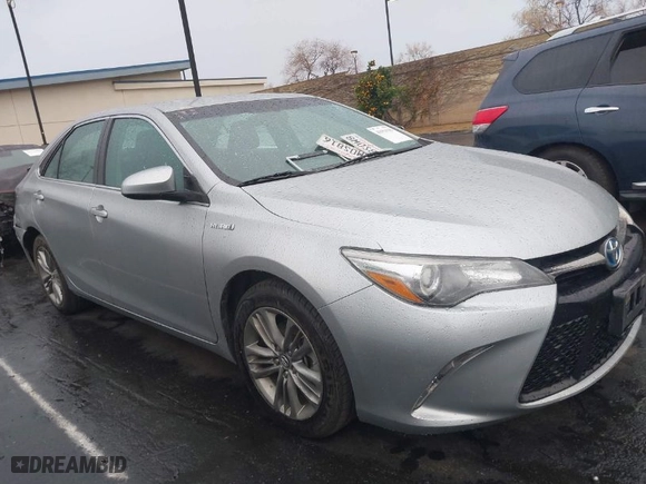 2016 Toyota Camry Hybrid LE with VIN 4T1BD1FKXGU196930, listed as a IAAI auction lot 41694789 with 89,149 mi miles. Bid and sale history available at carsss.com. Image 14.