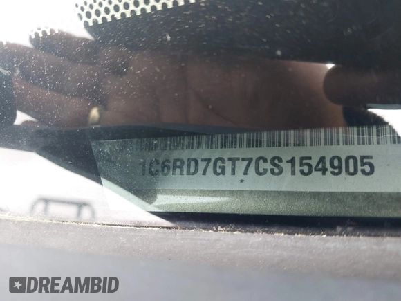 2012 Ram 1500 Big Horn z VIN 1C6RD7GT7CS154905, wystawiony jako IAAI lot #42267549 z przebiegiem 251 589 mil mil oraz . Historia ofert i sprzedaży dostępna na DreamBid. Obrazek 17.