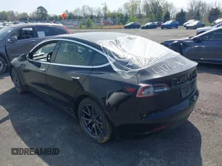 2019 Tesla Model 3 Mid Range with VIN 5YJ3E1EA0KF394514, listed as a IAAI auction lot 42080985 with Not Provided miles and . Bid and sale history available at DreamBid. Image 3.