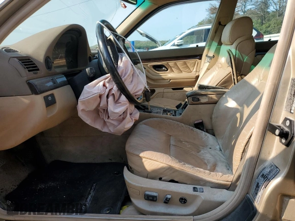 1997 BMW 7 Series 740il with VIN WBAGJ8325VDM04352, listed as a Copart auction lot 70189534 with 129,463 mi miles and Salvage Title. Bid and sale history available at carsss.com. Image 7.