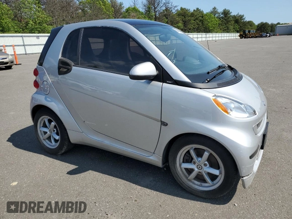 2011 Smart fortwo Pure with VIN WMEEJ3BA6BK449704, listed as a Copart auction lot 69454434 with 23,581 mi miles and Clean title. Bid and sale history available at DreamBid. Image 4.