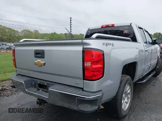 2018 Chevrolet Silverado 1500 LT with VIN 1GCVKREC7JZ151678, listed as a IAAI auction lot 41972011 with 106,892 mi miles and . Bid and sale history available at DreamBid. Image 16.