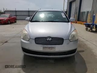 2006 Hyundai Accent GLS with VIN KMHCN46C46U048752, listed as a Copart auction lot 52930035 with 143,688 mi miles and Salvage title. Bid and sale history available at DreamBid. Image 5.
