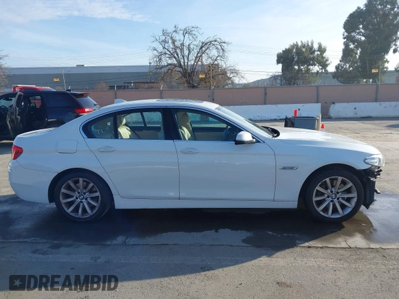 2014 BMW 5 Series 535d with VIN WBAXA5C51ED689365, listed as a IAAI auction lot 41852062 with 144,652 mi miles and . Bid and sale history available at carsss.com. Image 13.