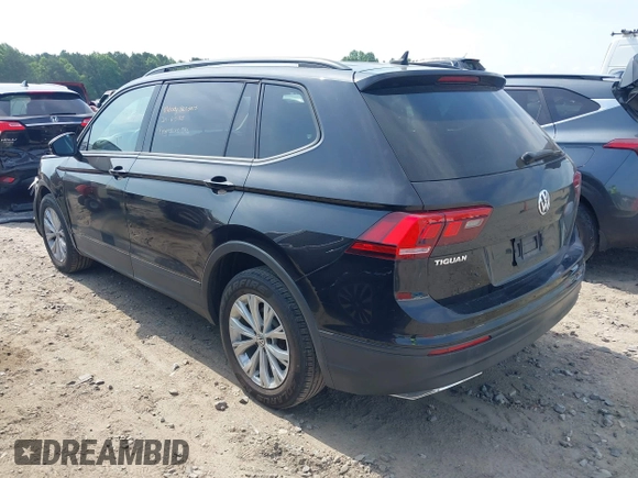 2020 Volkswagen Tiguan S with VIN 3VV1B7AX1LM086019, listed as a IAAI auction lot 42458434 with 114,413 mi miles and . Bid and sale history available at DreamBid. Image 3.