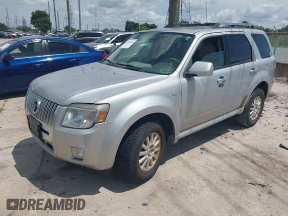 2009 Mercury Mariner Premier z VIN 4M2CU97779KJ00665, wystawiony jako IAAI lot #42698060 z przebiegiem 162 205 mil mil oraz . Historia ofert i sprzedaży dostępna na DreamBid. Obrazek 2.