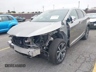 2021 Lexus RX 450h with VIN 2T2HGMDA3MC060208, listed as a IAAI auction lot 42163455 with 34,167 mi miles and . Bid and sale history available at DreamBid. Image 18.