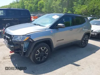 2021 Jeep Compass Trailhawk z VIN 3C4NJDDB7MT590390, wystawiony jako IAAI lot #42163205 z przebiegiem 70 551 mil mil oraz . Historia ofert i sprzedaży dostępna na DreamBid. Obrazek 2.