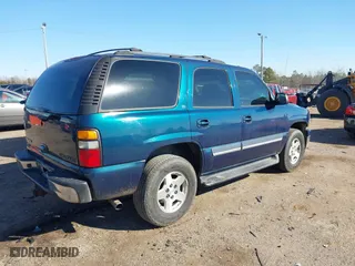 2005 Chevrolet Tahoe LT with VIN 1GNEC13T45R126445, listed as a IAAI auction lot 41389708 with 182,369 mi miles. Bid and sale history available at carsss.com. Image 4.