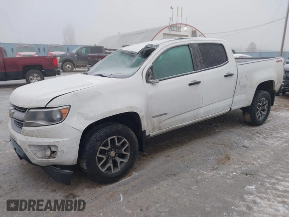 2018 Chevrolet Colorado 4WD Work Truck z VIN 1GCGTBEN3J1271023, wystawiony jako IAAI lot #41013812 z przebiegiem 124 032 mil mil oraz . Historia ofert i sprzedaży dostępna na DreamBid. Obrazek 18.