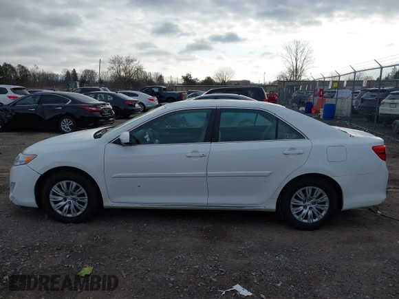 2014 Toyota Camry L with VIN 4T4BF1FKXER374901, listed as a IAAI auction lot 41861839 with 130,990 mi miles and . Bid and sale history available at DreamBid. Image 14.
