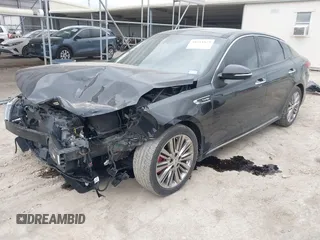 2016 Kia Optima SXL Turbo with VIN 5XXGV4L2XGG120045, listed as a IAAI auction lot 41511829 with 107,760 mi miles. Bid and sale history available at carsss.com. Image 2.