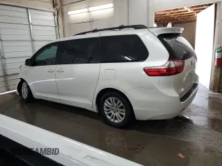 2015 Toyota Sienna XLE with VIN 5TDYK3DC4FS667923, listed as a Copart auction lot 86730854 with 62,486 mi miles and Salvage Title. Bid and sale history available at DreamBid. Image 2.
