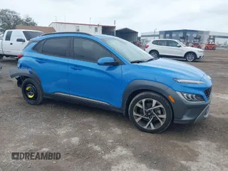 2022 Hyundai Kona Limited with VIN KM8K53A30NU883808, listed as a IAAI auction lot 41763757 with 49,811 mi miles. Bid and sale history available at carsss.com. Image 1.