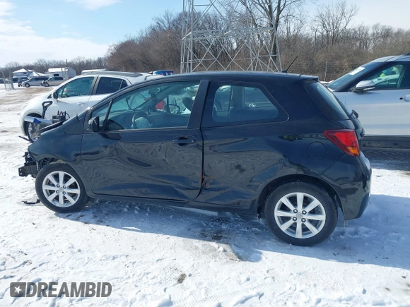 2015 Toyota Yaris L with VIN VNKJTUD34FA055116, listed as a IAAI auction lot 41601874 with 84,508 mi miles. Bid and sale history available at carsss.com. Image 14.